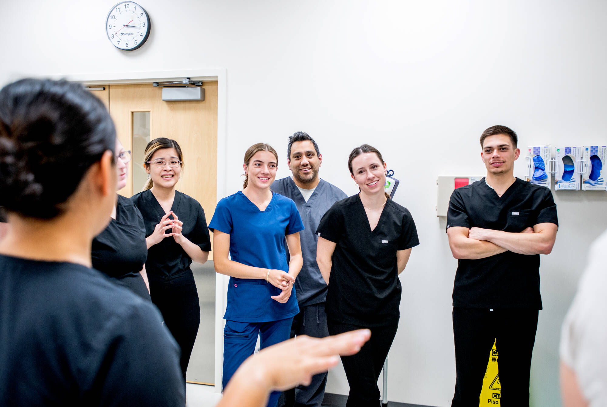 Students listening to professor